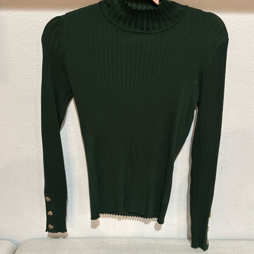 Sweater. Runs small.